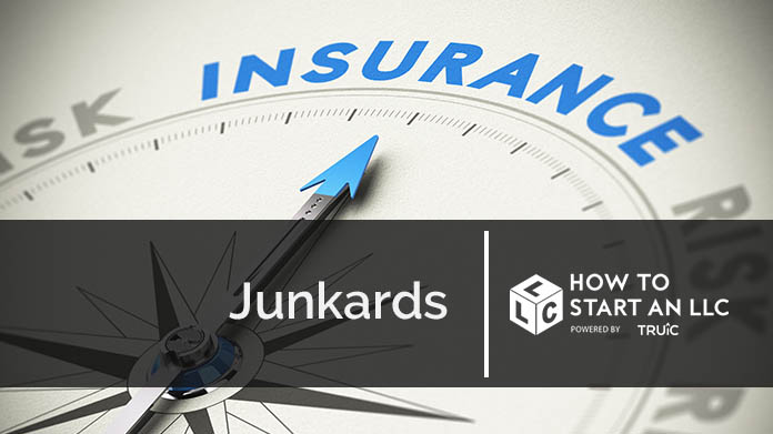 Compass needle pointing towards blue insurance logo